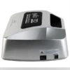 A close-up of a silver electronic device with a display screen on top, labeled "Gel II Cordless Lamp 7D Diamond Edition". It shows caution and power switch labels on the front side, reminiscent of the sleek design found in the Gel II Cordless Lamp 7D Diamond Edition.