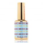 A bottle of DND DC Top Gel No Cleanser 0.5oz with a gold cap.