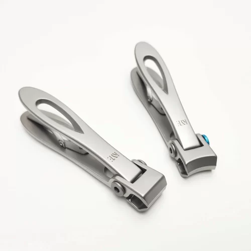 Two KYE Wide Jaw Toe Nail Clipper on a white surface.