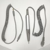 A TP-339 Coreless Handpiece Nail Drill (Compatible with UP200, ManiPro, & Pro Power 20K) featuring a pair of wires and a coiled cord on a white surface.