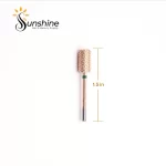 Gold-toned cylindrical nail drill bit with KYE Premium Bit Large Barrel Smooth Safety Top 6.6mm measurement indicator showing 1.5 inches in length, on a white background with "sunshine nails & beauty supply" logo at the top