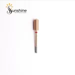 Gold-colored KYE Premium Bit Small Barrel Smooth Safety Top 5.35mm nail drill bit on a plain background with the sunshine nails & beauty supply logo at the top.