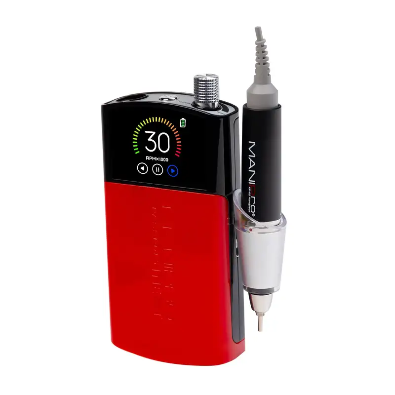 A sleek ManiPro Passport Next Complete Black digital device with a display screen showing "30 RPM x1000" and a connected manual tool attached in a holder.