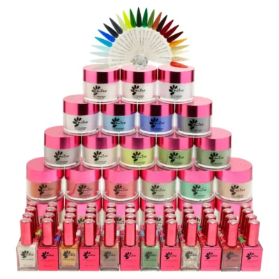 A tiered display presents a variety of colorful nail powders and polishes with pink lids and a vibrant color wheel on top, all part of the Nitro WISH Collection 3-in-1 Powder, Gel, & Lacquer featuring 24 colors.